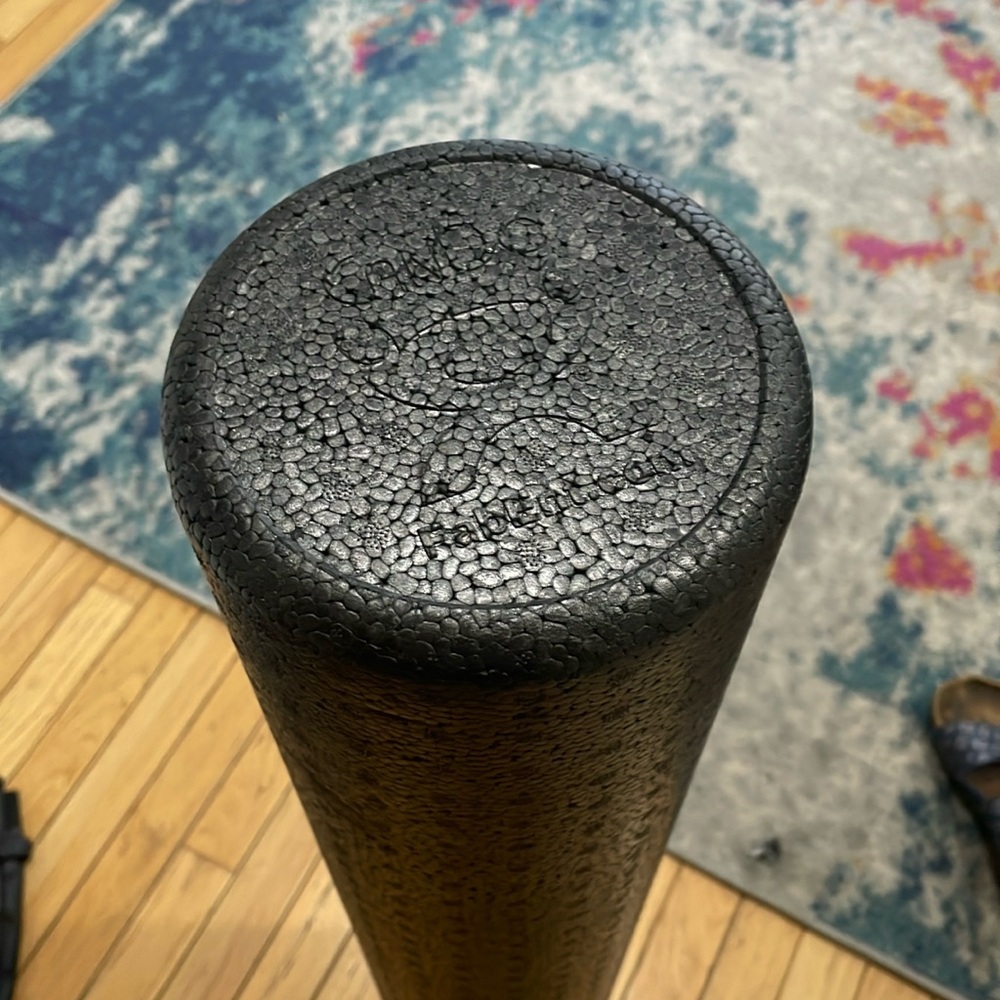 Black foam roller 36 inches. Firm. Very good condition.